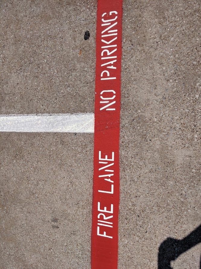 Stencil markings applied by machine